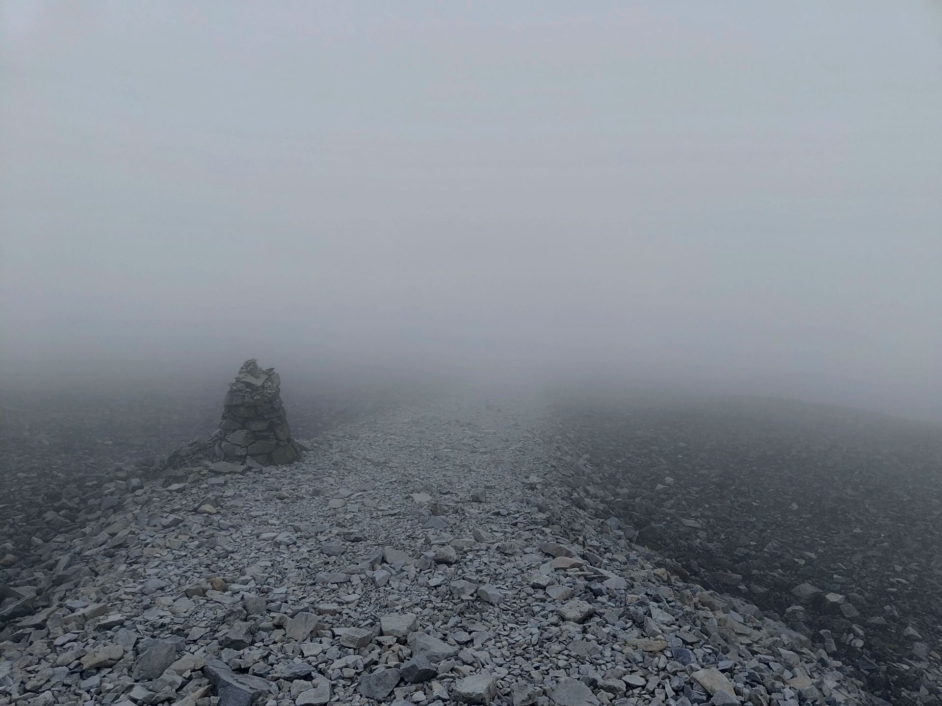 A way-stone in the fog