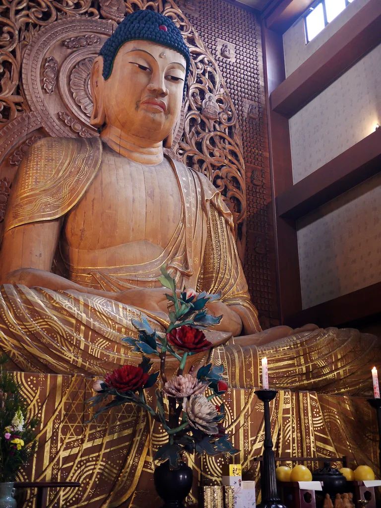 Buddha aus Holz (Credit: Hunter Nield, Flickr.com)